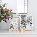 A pair of White Enamel Flower & Gold Plated Photo Frames