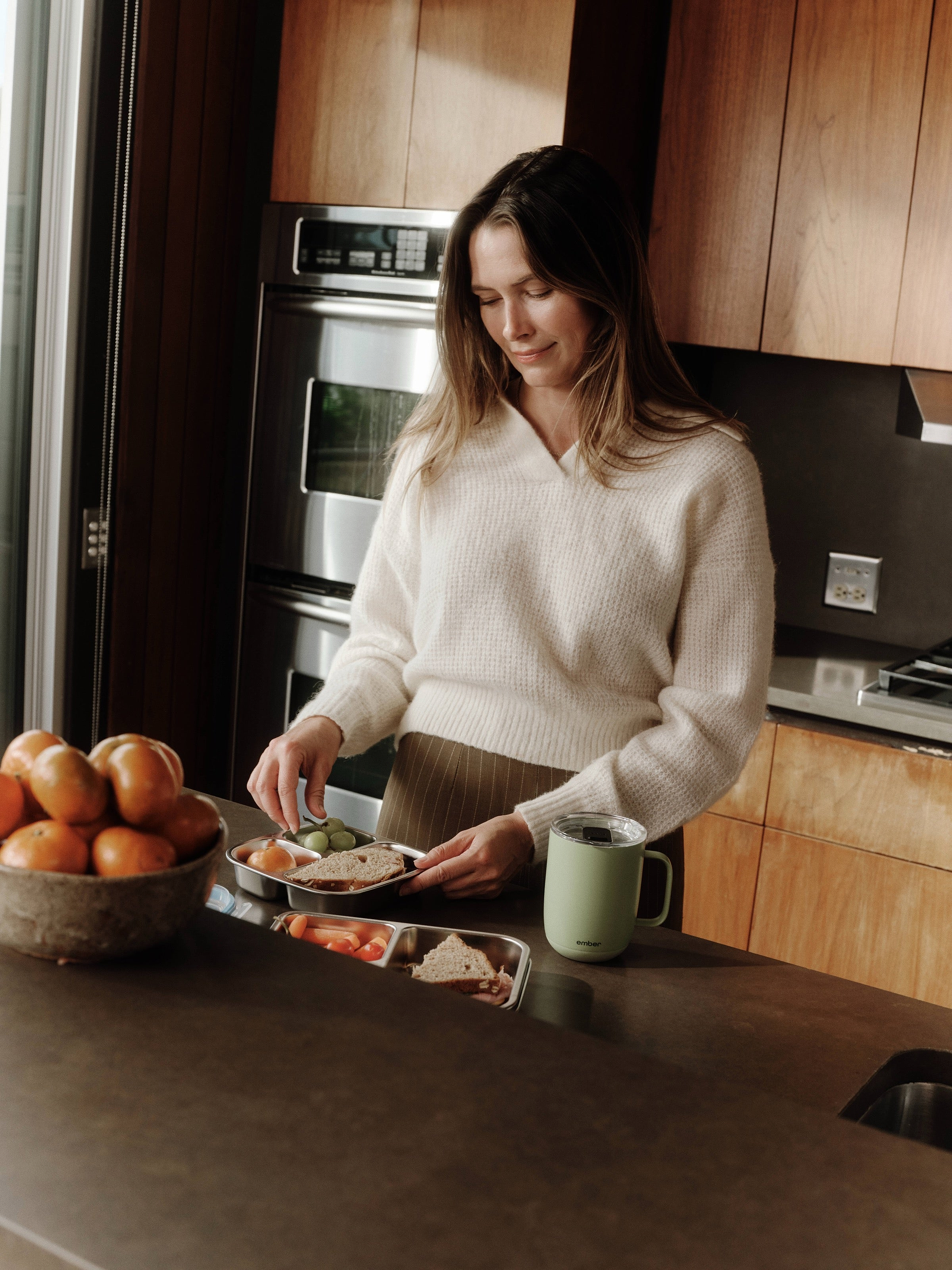 Ember Mug 3 alongside morning food preparation in the kitchen