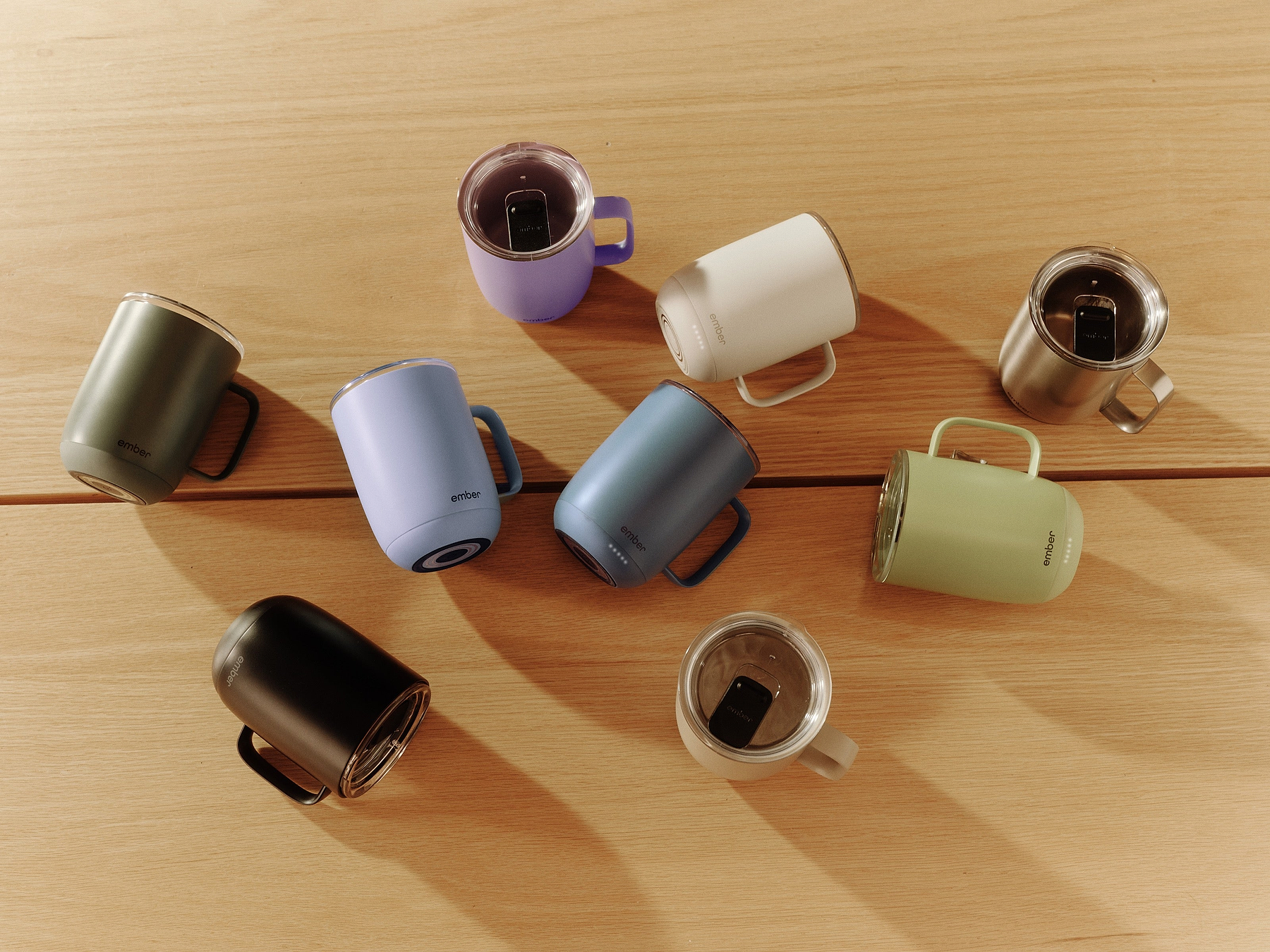 An overhead view of the Ember Mug 3 color assortment