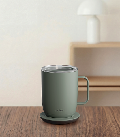 Ember Mug 3 in Sage Green, 14 oz, on a desk