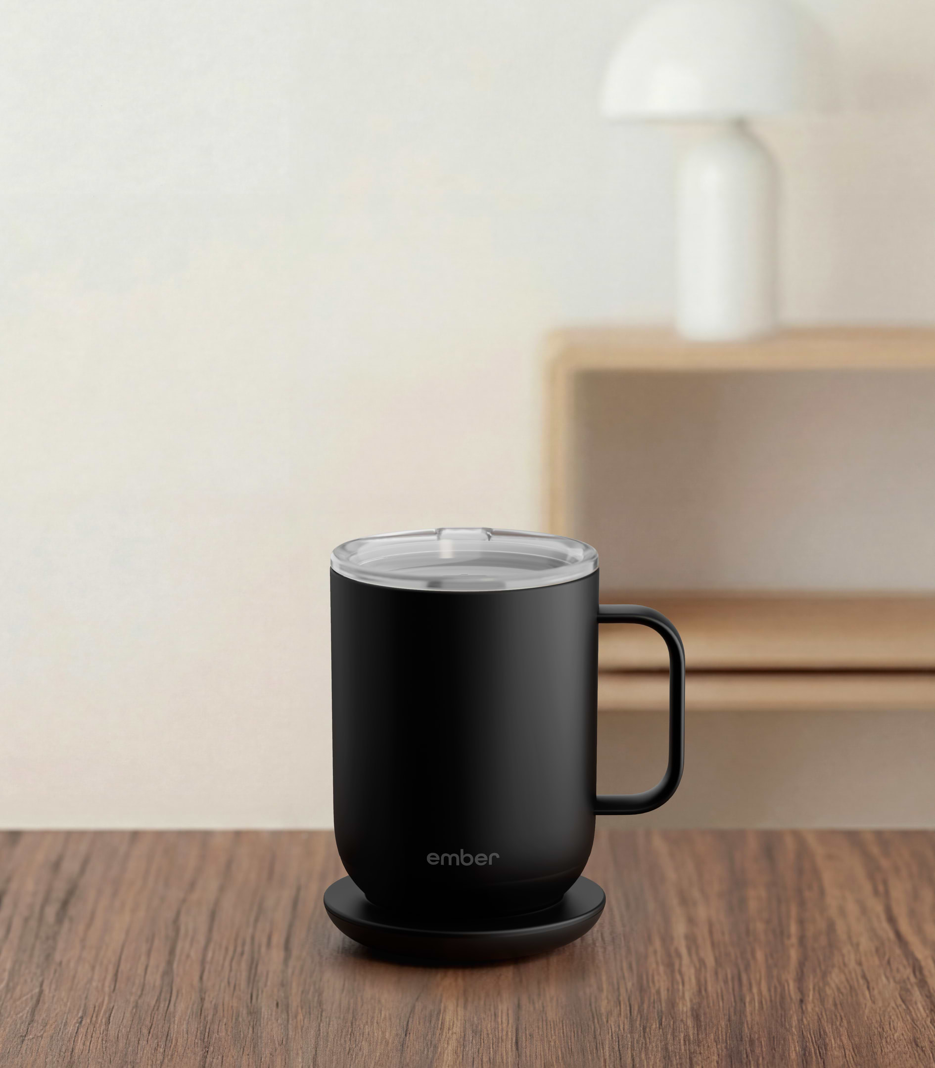 Ember Mug 3 in Black, 10 oz, on a desk