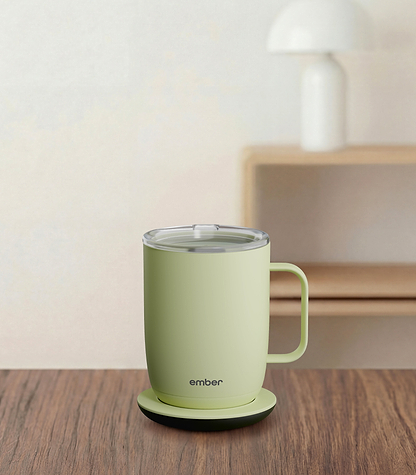 Ember Mug 3 in Matcha Green, 14 oz, on a desk