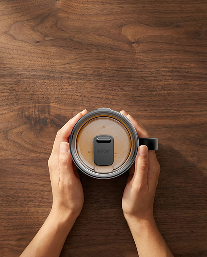 Ember Mug 3 in Black, 14 oz, top-down with coffee