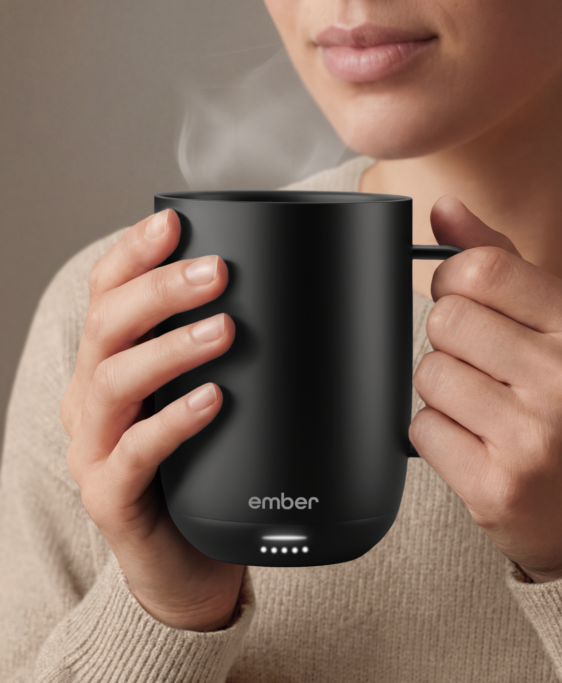 Ember Mug 3 in Black, 14 oz, held in hands
