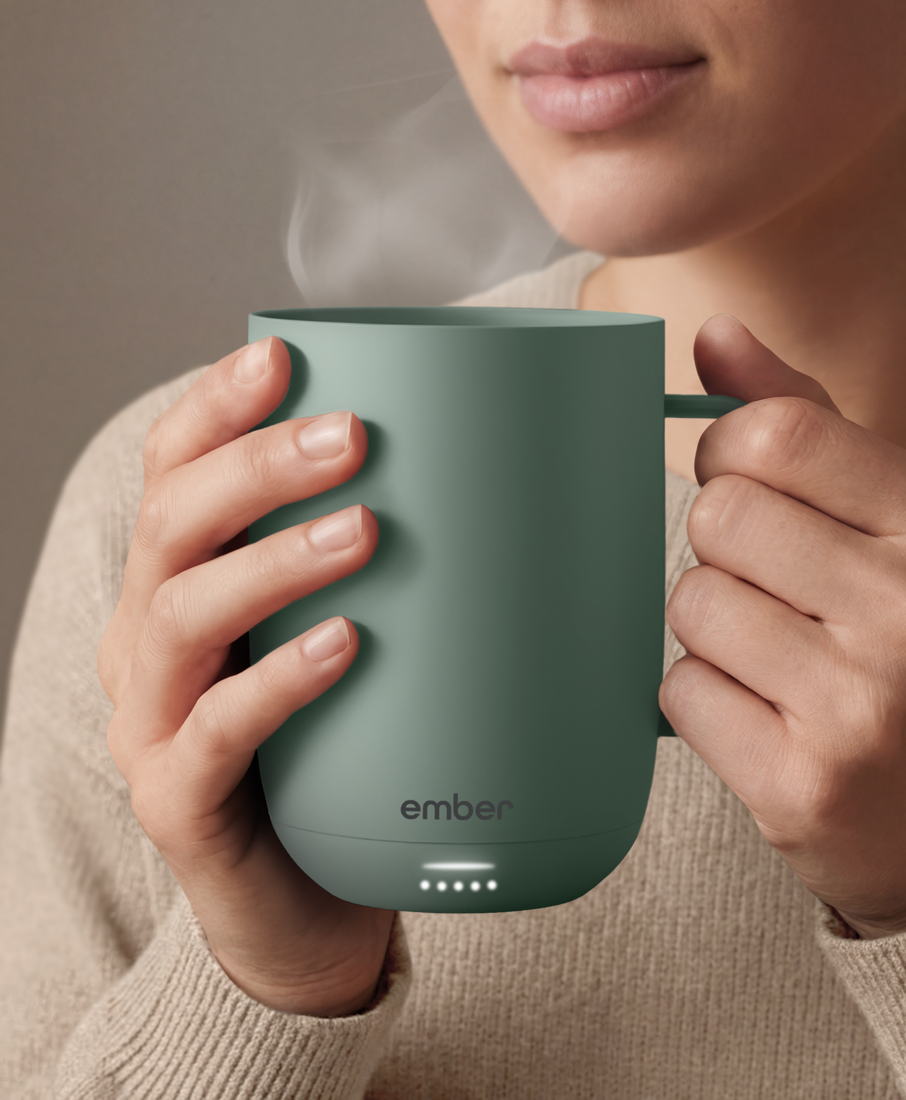 Ember Mug 3 in Sage Green, 14 oz, held in hands