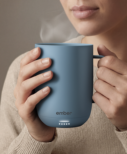 Ember Mug 3 in Salt Blue, 14 oz, held in hands