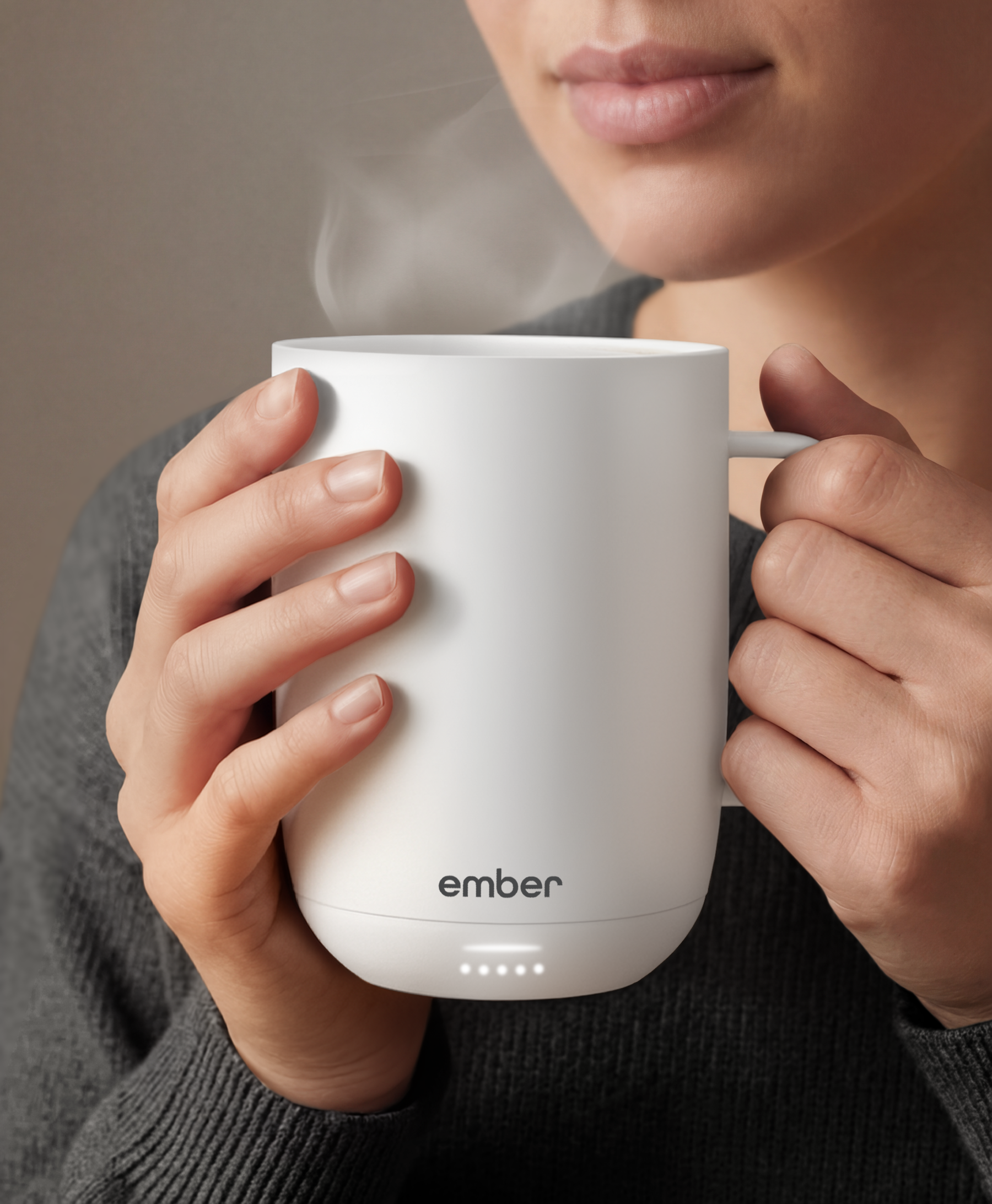 Ember Mug 3 in White, 14 oz, held in hands