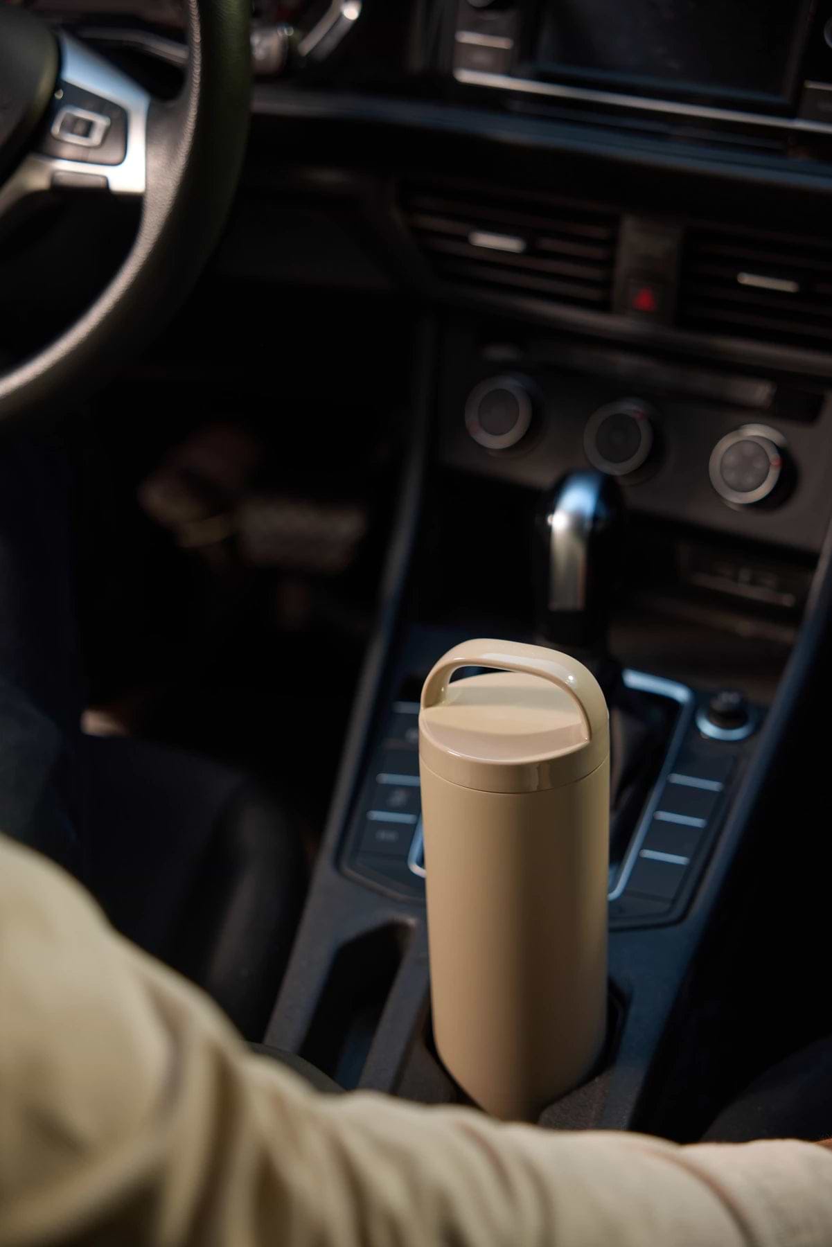 Sandstone Tumbler 2 seated in a car cupholder