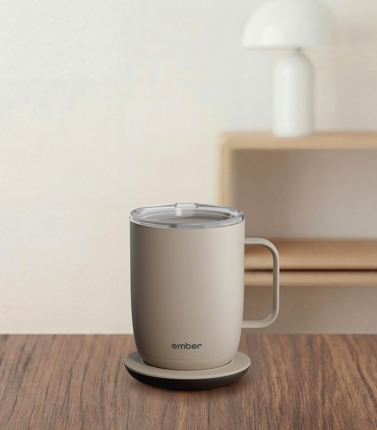 Ember Mug 3 in Sandstone, 14 oz, on a desk