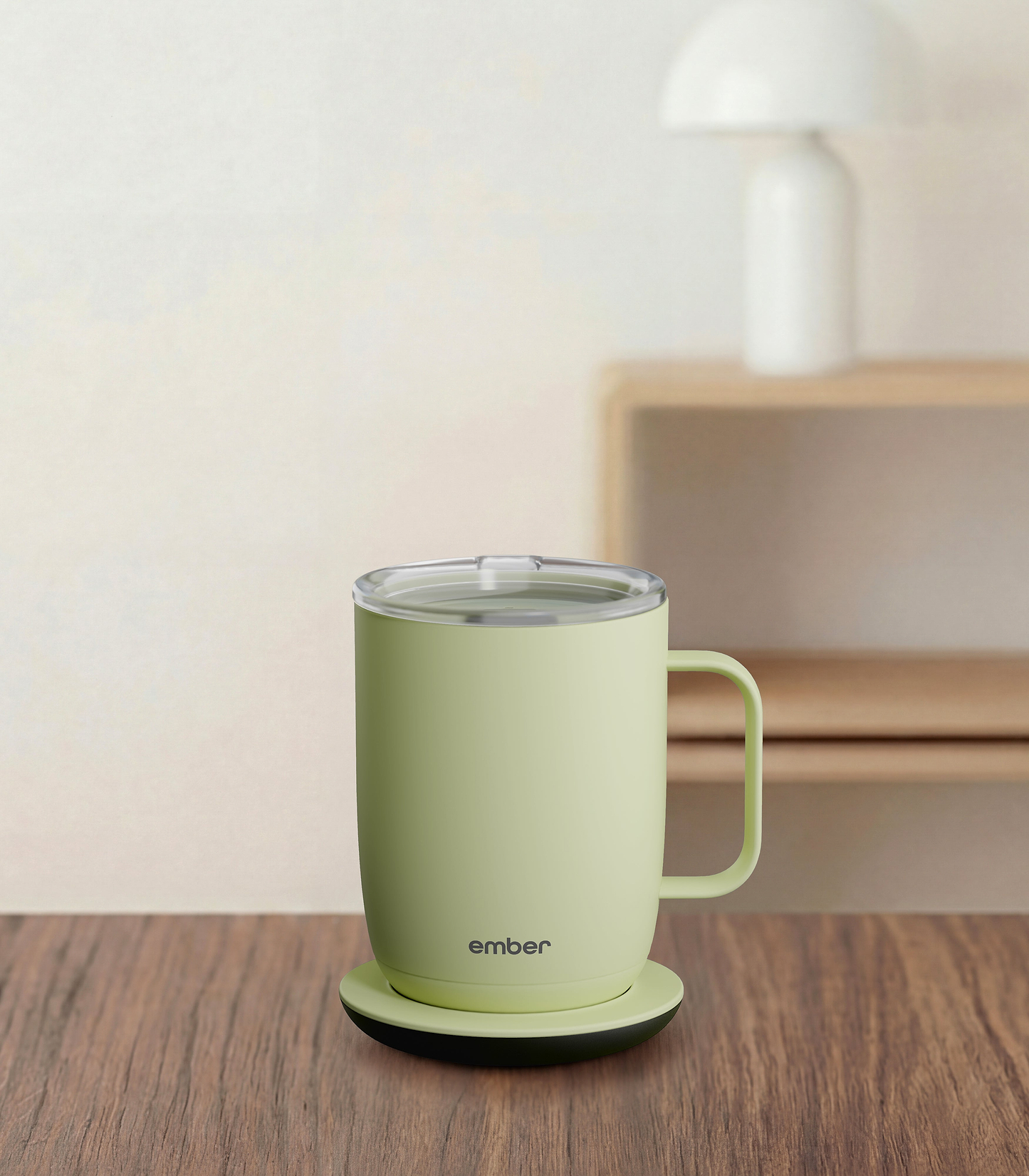 Ember Mug 3 in Matcha Green, 14 oz, on a desk