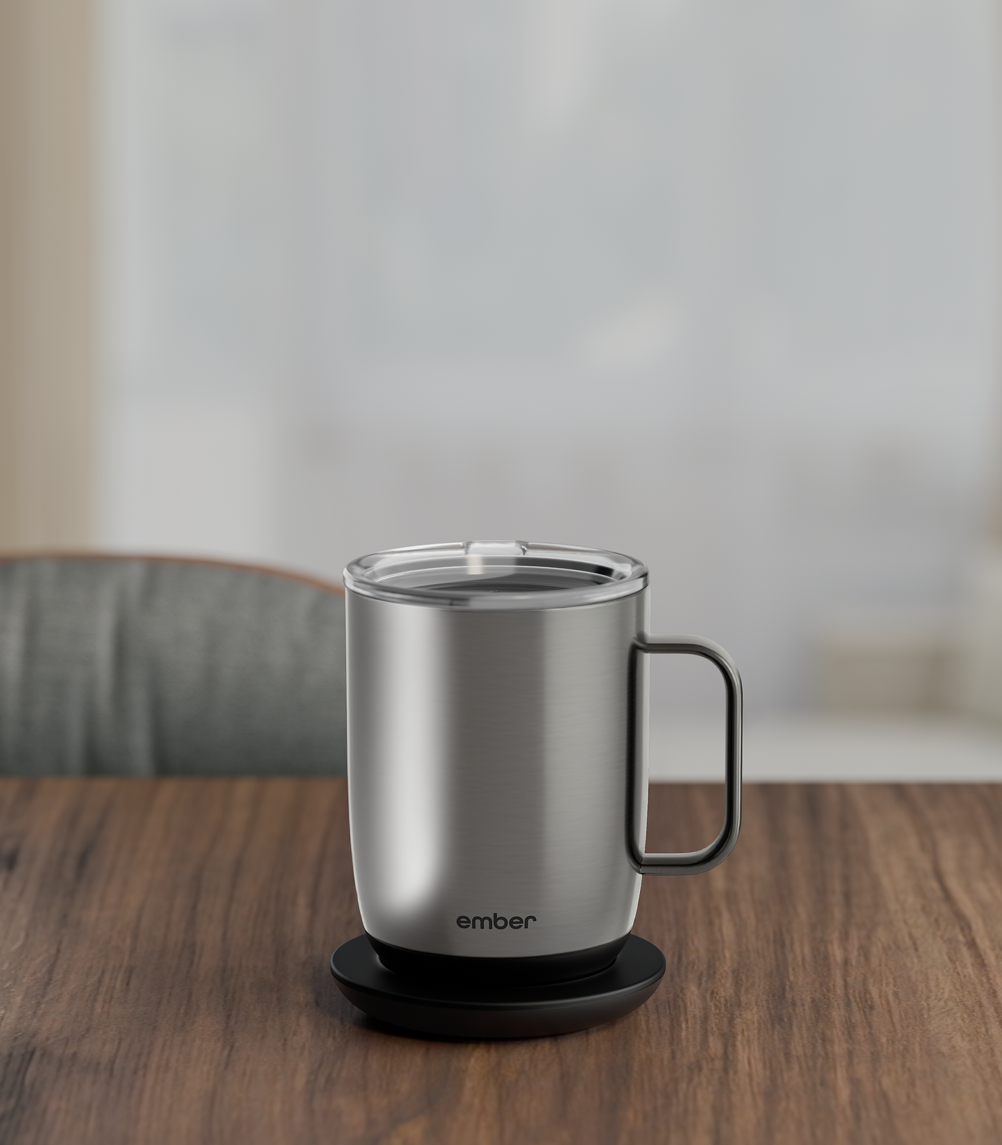 Ember Mug 3 in Stainless Steel Edition, 14 oz, on a desk