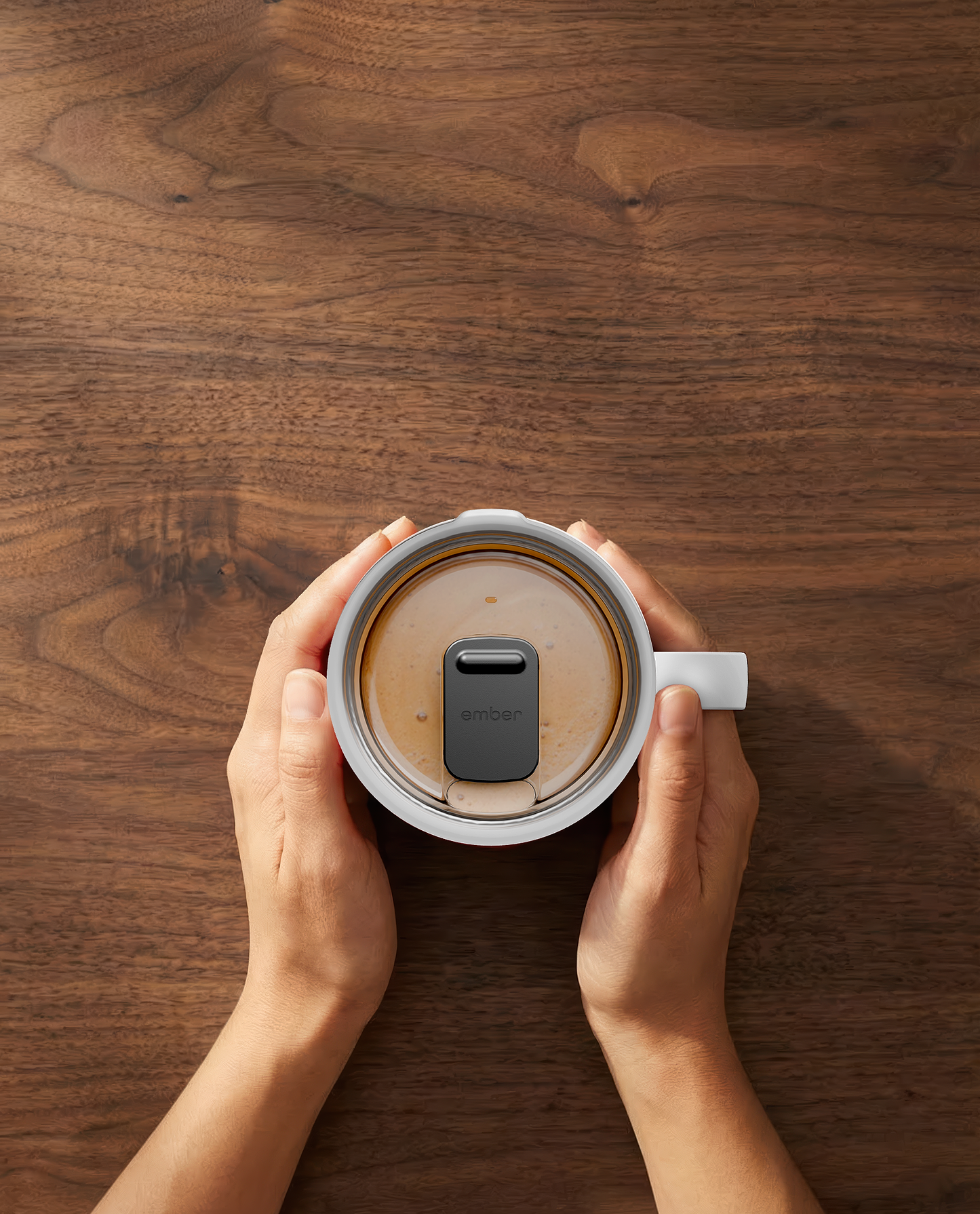 Ember Mug 3 in White, 14 oz, top-down with coffee