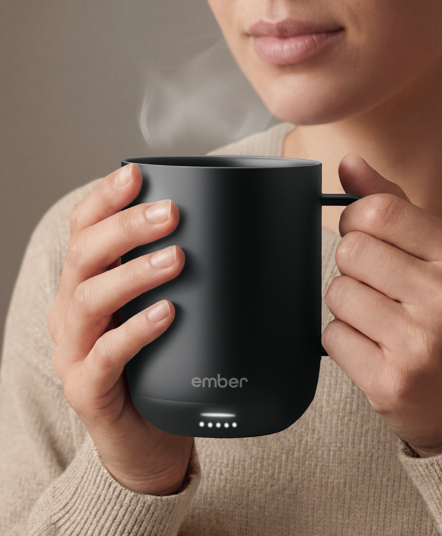 Ember Mug 3 in Black, 10 oz, held in hands