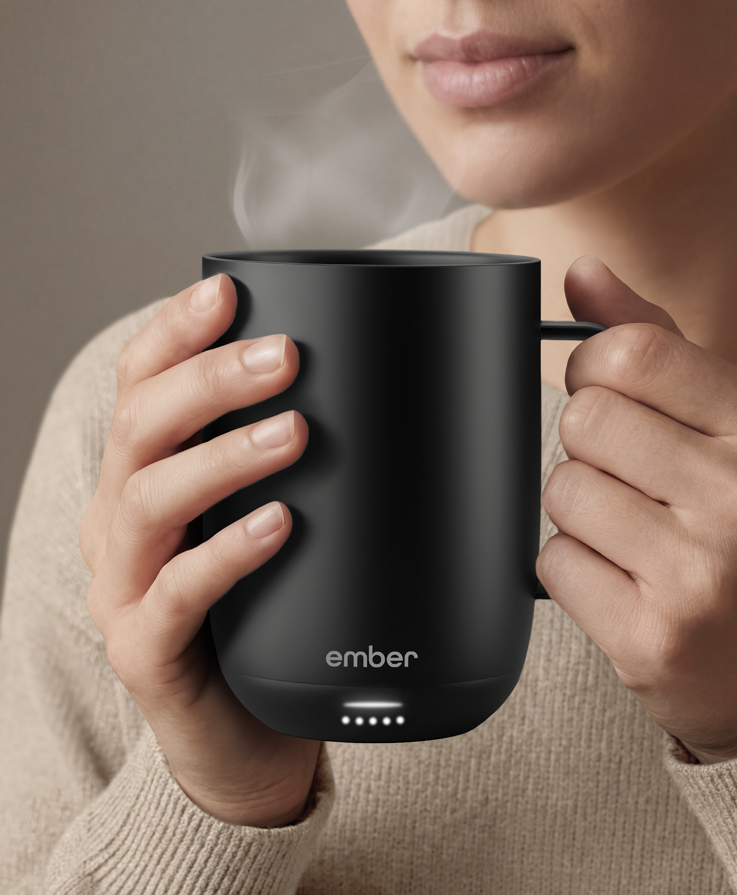 Ember Mug 3 in Black, 14 oz, held in hands