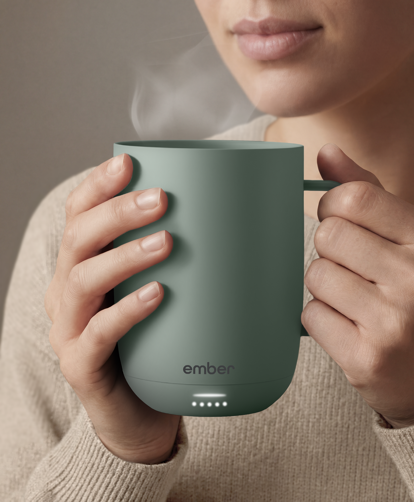 Ember Mug 3 in Sage Green, 14 oz, held in hands