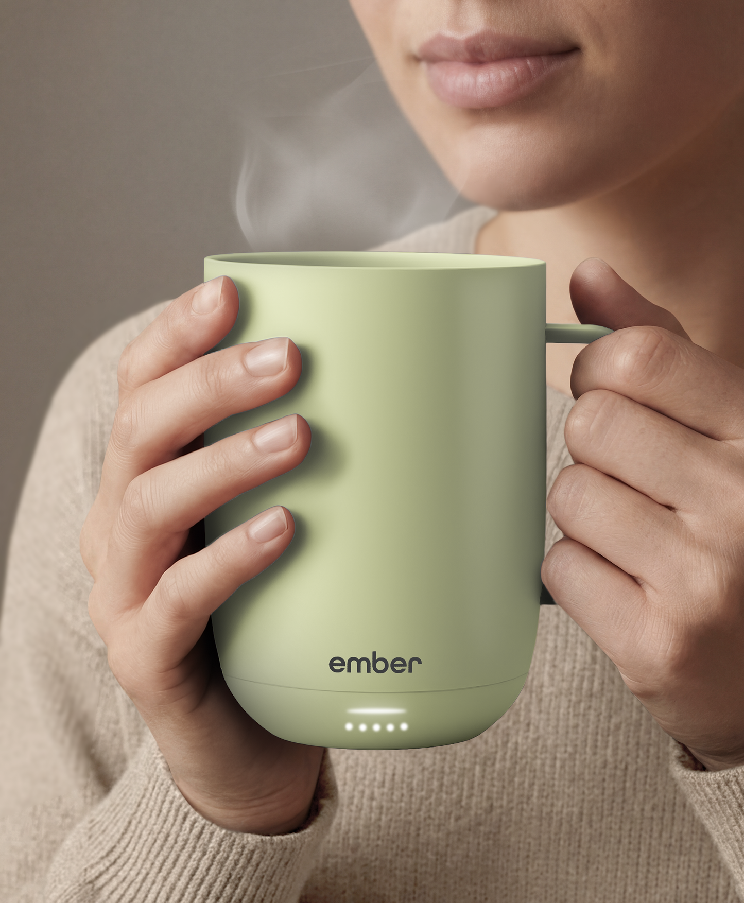 Ember Mug 3 in Matcha Green, 14 oz, held in hands