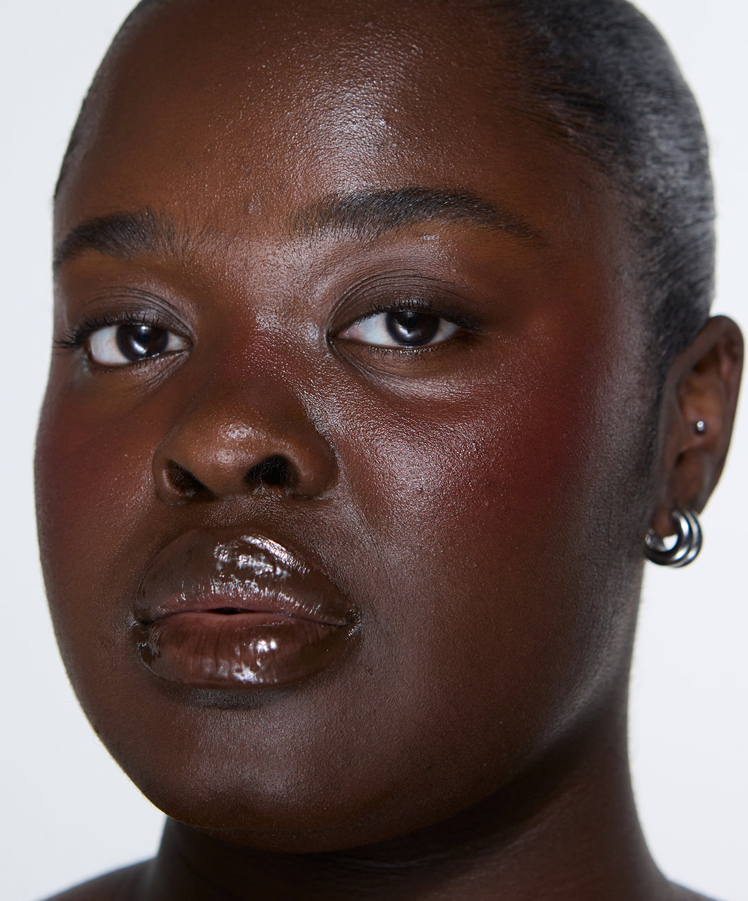 Model wears Lip Gloss in Clove