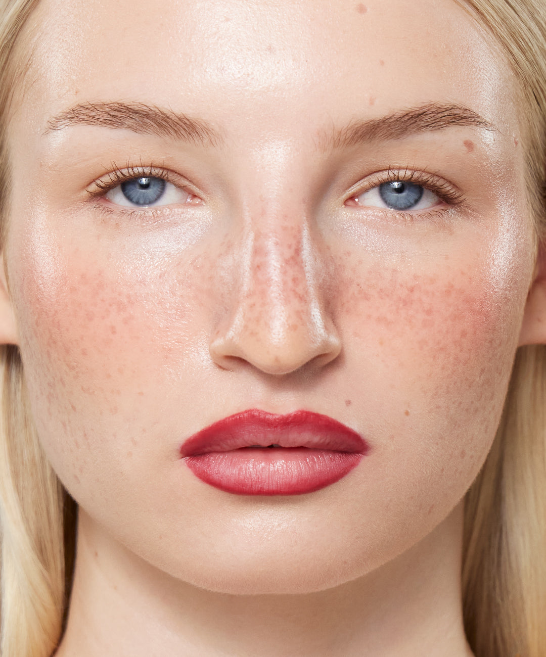 Model wears Lip Sculpt in Red