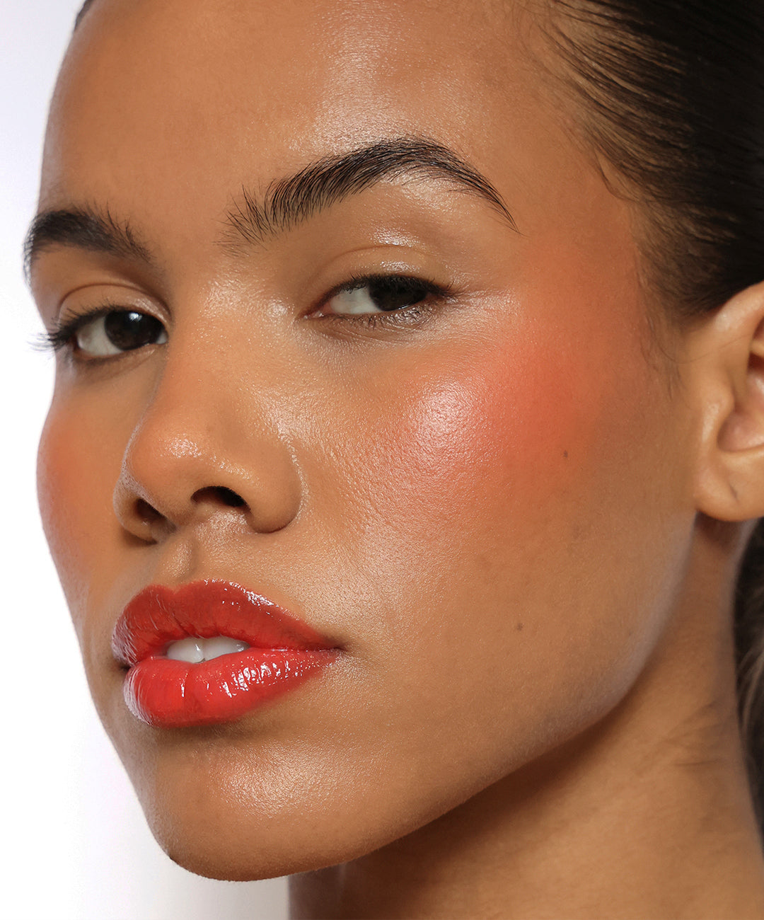 Model wears shade Papaya