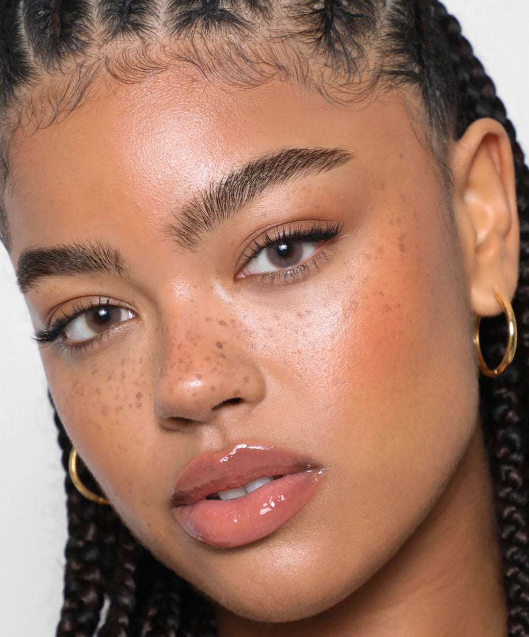 | desc: | text: light Model wears Brow Tint in Deep Brown