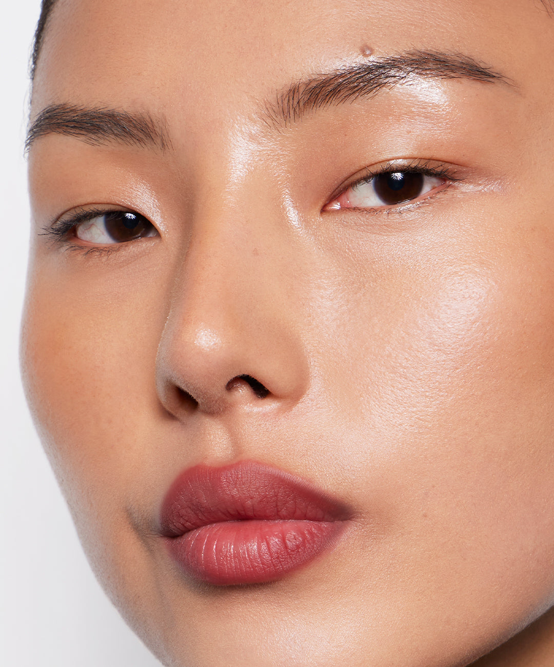 | desc: Cho wears Blur Liner in shade Berry