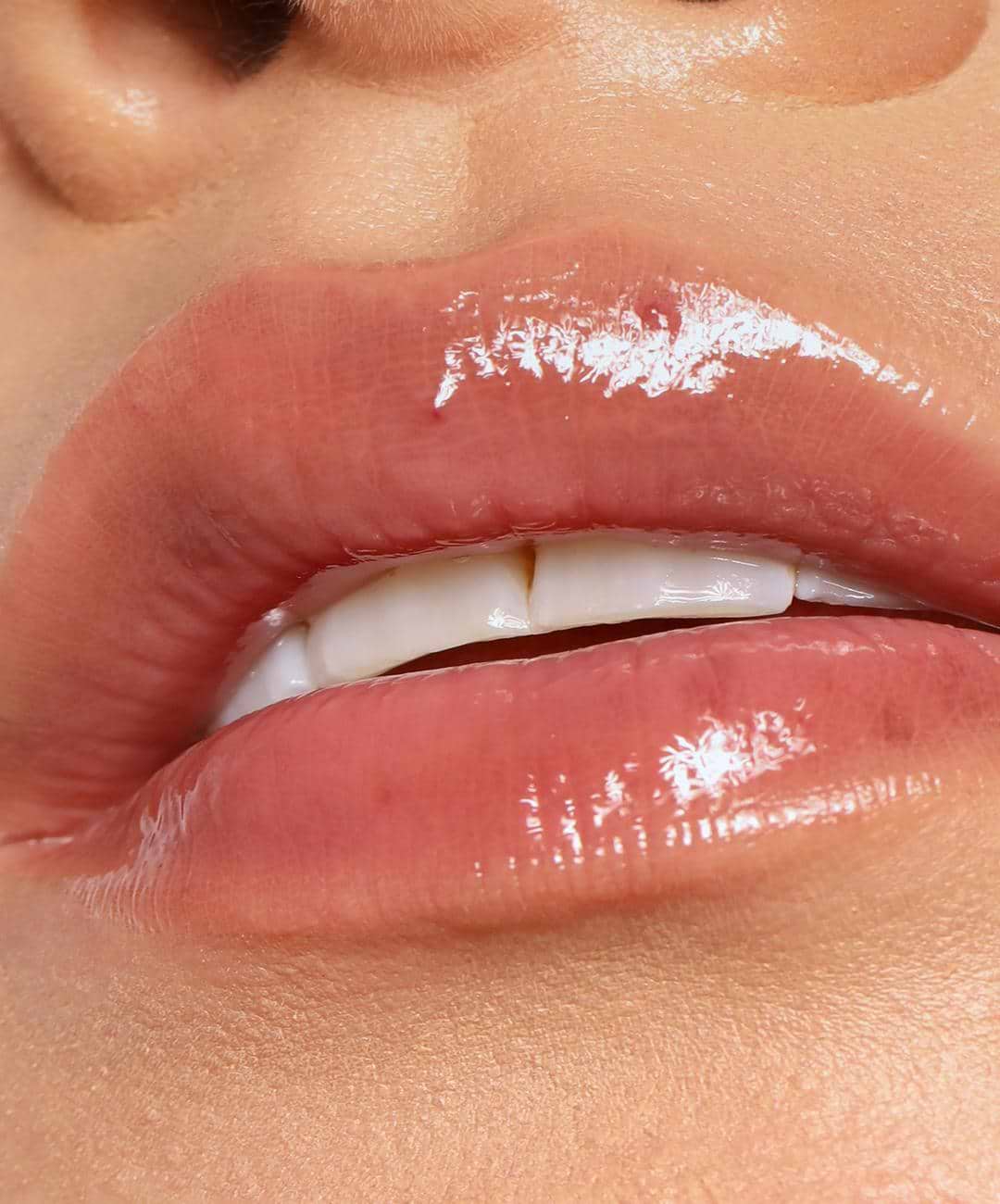 | desc: Lip Gloss in shade Rosewood