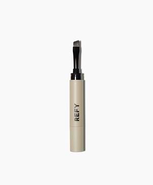 image show the Refy Brow Pomade brush and packaging in shade light