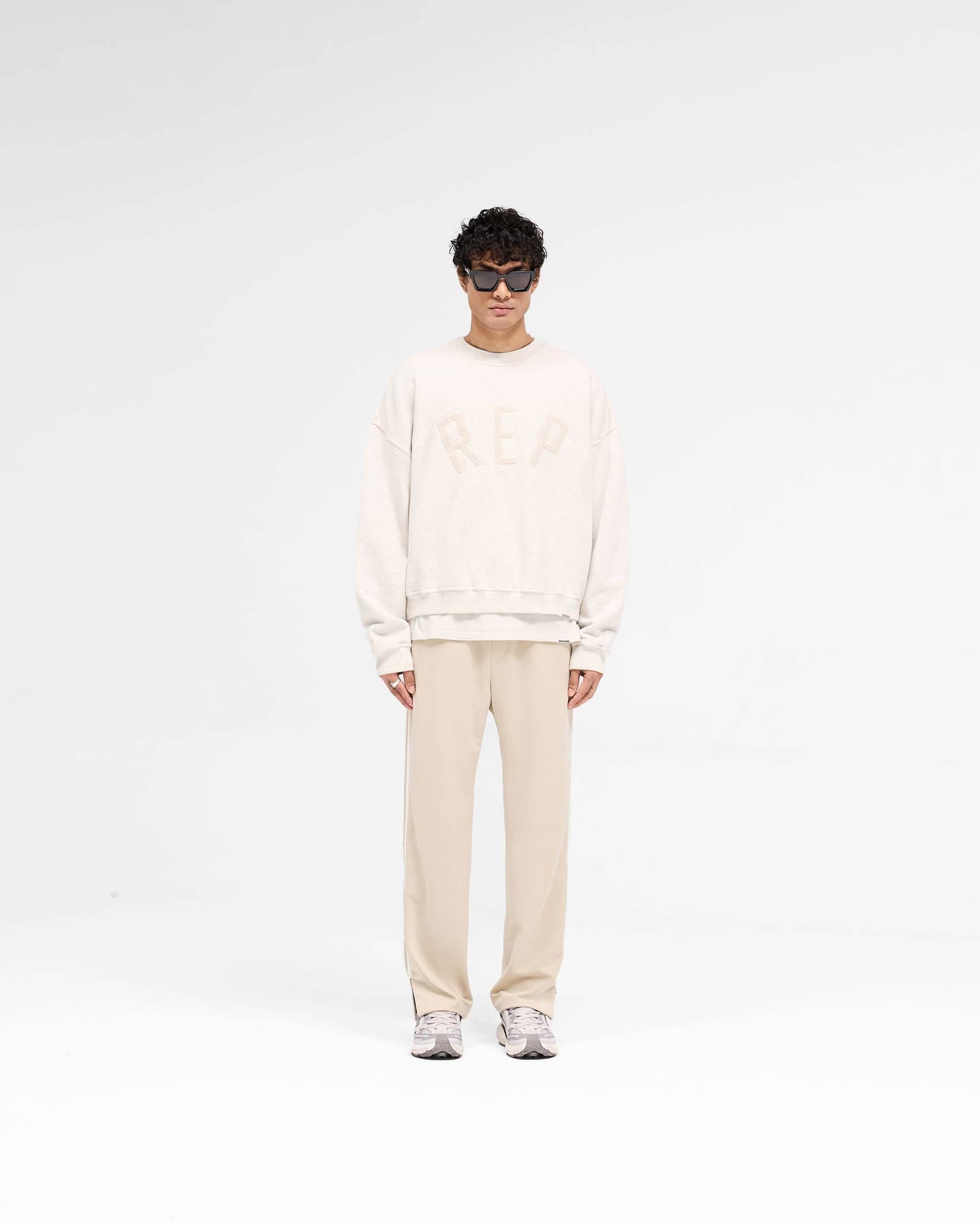 Rep Applique Sweater - Cream Marl