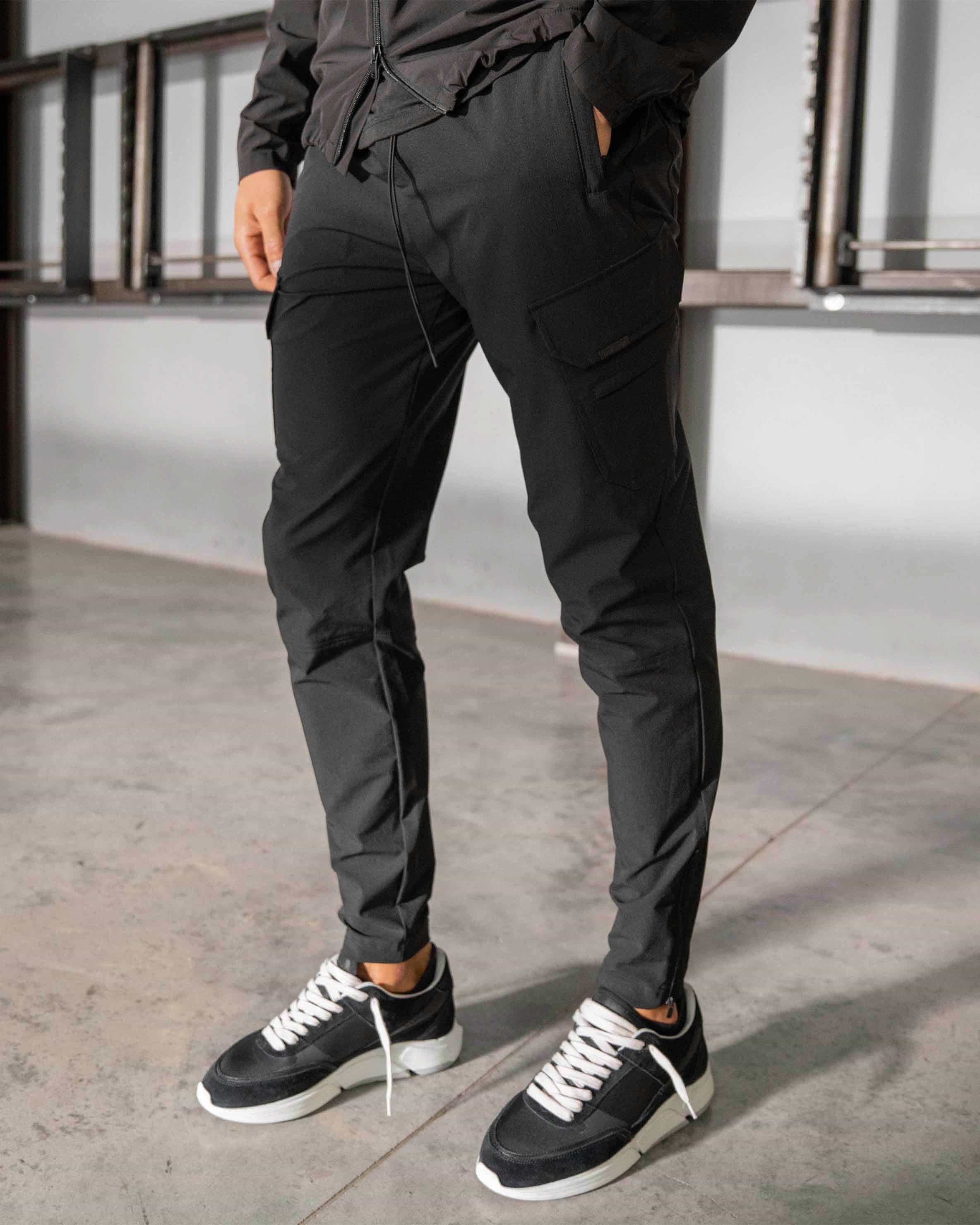 Back product image of a mens black pant on a plain white background | 247 Zip Pant in Black | Combat trousers with cargo and zip pockets | 247 Pants | Represent Clo