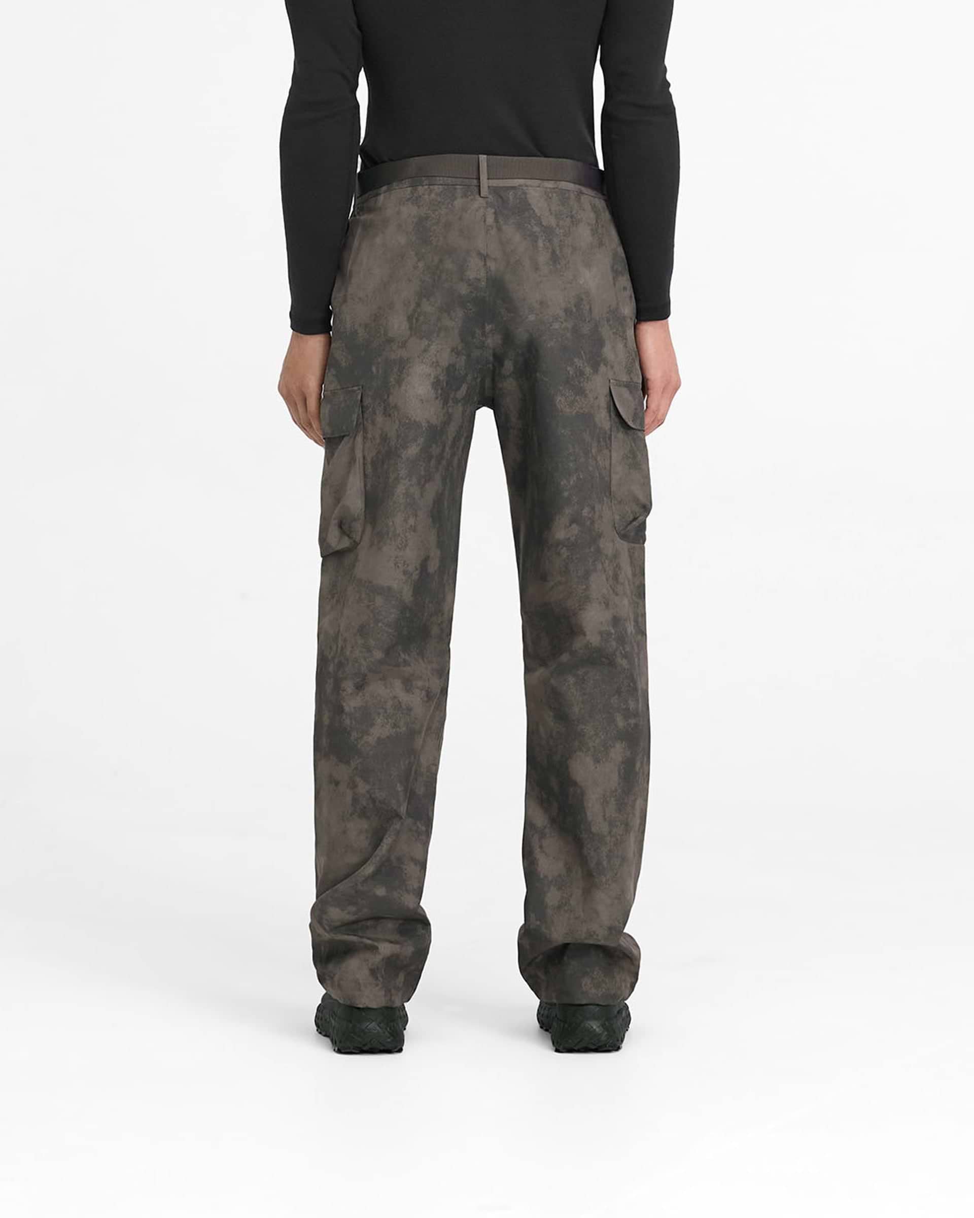 Man wearing terrain cargo pants on a plain white background | 247 Technical Cargo Pant in Terrain | Showerproof straight leg cargo pants with technical cargo pockets | 247 Pants | Represent Clo
