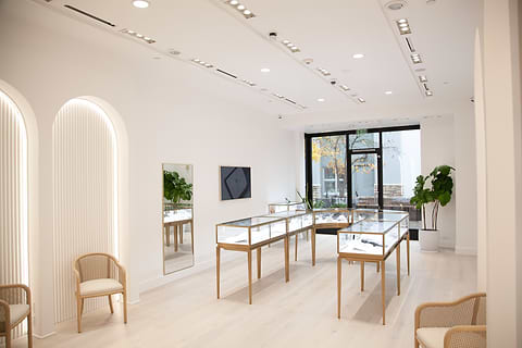 MiaDonna's new store at Bridgeport Village, with jewelry cases, chairs, and plants