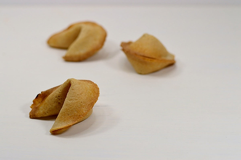 proposing at home by hiding a note and engagement ring inside of a fortune cookie
