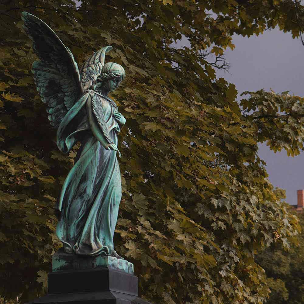 Angel statue in a cemetery.