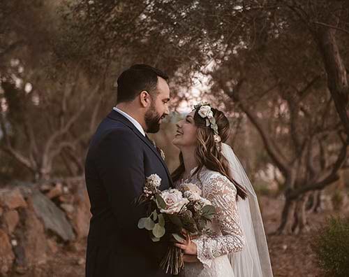 <img alt="miadonna featured couple" src="https://scdn.speedsize.com/d9acbe11-c0cc-4d19-a1ce-748a0fd38b05/cdn.shopify.com/s/files/1/1164/4258/files/michael-and-susie-4.jpg?v=1529434142" style="float: none;" />