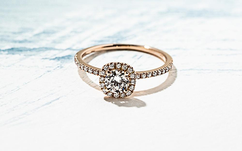 affordable vintage style diamond halo engagement ring in rose gold