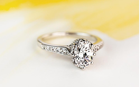inexpensive antique style diamond accented ring with oval cut lab diamond