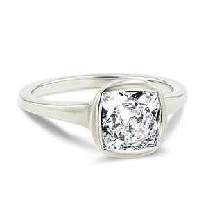 bezel set satin finish engagement ring with cushion cut lab grown diamonds