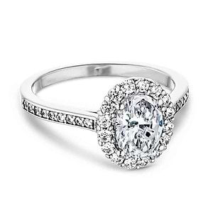 Diamond accented halo engagement ring with 1ct oval cut lab created diamond in 14k white gold setting