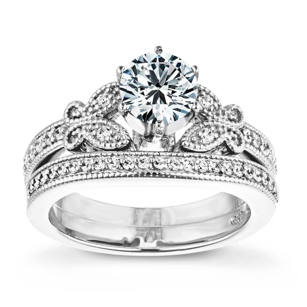 Shown with a 1.0ct Round cut Lab-Grown Diamond with milgrain detail and recycled diamonds in recycled 14K white gold and matching wedding band| antique butterfly milgrain wedding set Shown with a 1.0ct Round cut Lab-Grown Diamond with milgrain detail and recycled diamonds in recycled 14K white gold