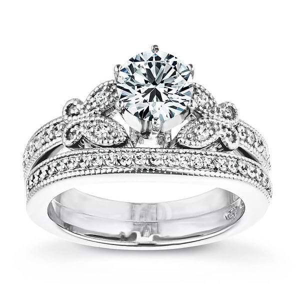 Shown with a 1.0ct Round cut Lab-Grown Diamond with milgrain detail and recycled diamonds in recycled 14K white gold and matching wedding band| antique butterfly milgrain wedding set Shown with a 1.0ct Round cut Lab-Grown Diamond with milgrain detail and recycled diamonds in recycled 14K white gold