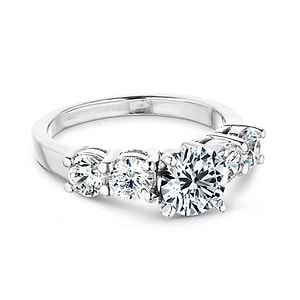Accented engagement ring with a 1ct round cut lab grown diamond amid diamond hybrid simulants totaling 1ctw in 14k white gold