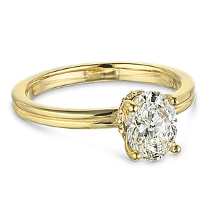Beautiful hidden halo engagement ring with 1.5ct oval cut lab grown diamond in 14k yellow gold