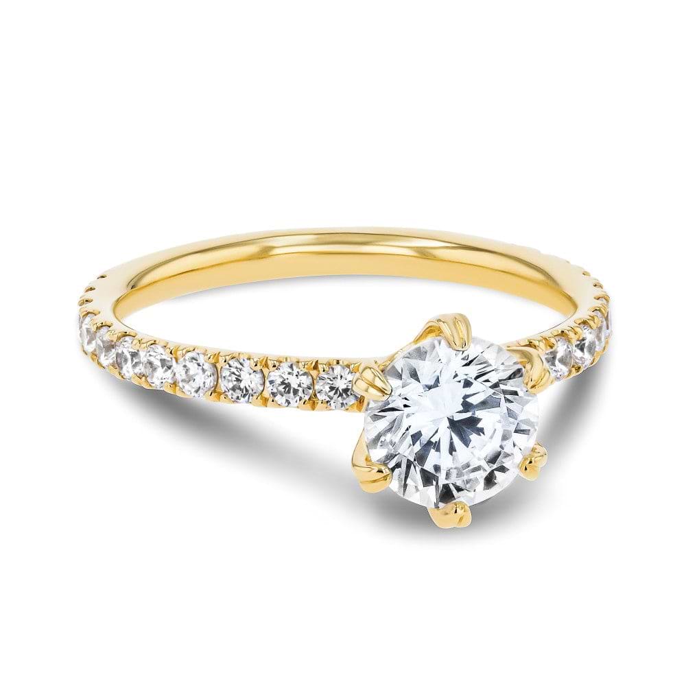 Shown here with a 1.0ct Round Cut Lab Grown Diamond center stone in 14K Yellow Gold|diamond accented 6 prong head engagement ring with round cut lab grown diamond center stone set in 14k yellow gold recycled metal
