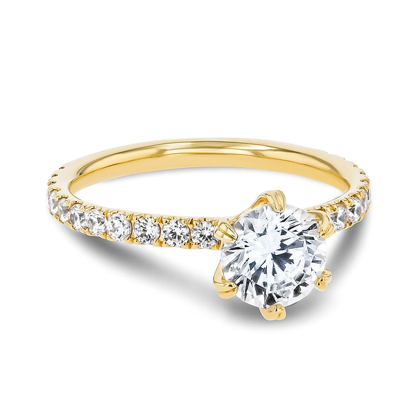 Shown here with a 1.0ct Round Cut Lab Grown Diamond center stone in 14K Yellow Gold|diamond accented 6 prong head engagement ring with round cut lab grown diamond center stone set in 14k yellow gold recycled metal