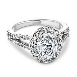 Unique nature inspired flower halo engagement ring with diamond accented split shank holding a 1ct oval cut lab grown diamond in 14k white gold
