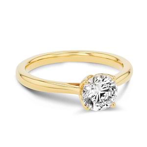 solitaire engagement ring with nature inspired floral prong head with lab grown diamond center stone set in 14k yellow gold metal