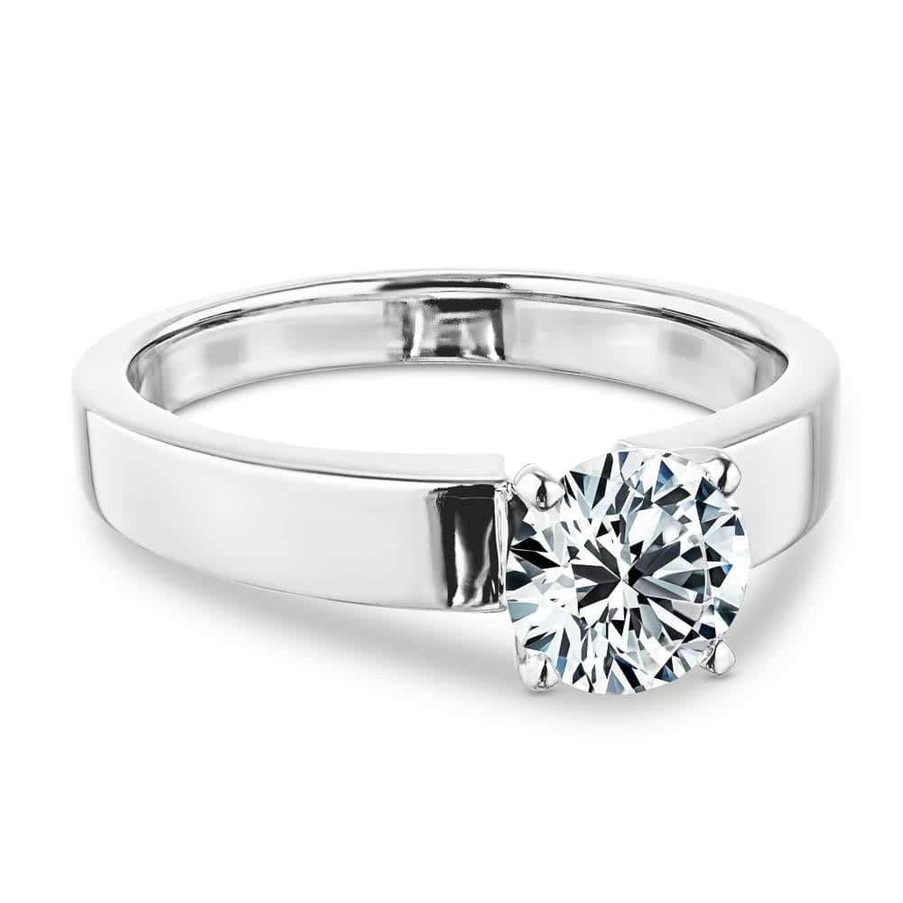 Shown with 1ct Round Cut Lab Grown Diamond in 14k White Gold|Modern minimalistic solitaire engagement ring with 1ct round cut lab grown diamond in thick 14k white gold band