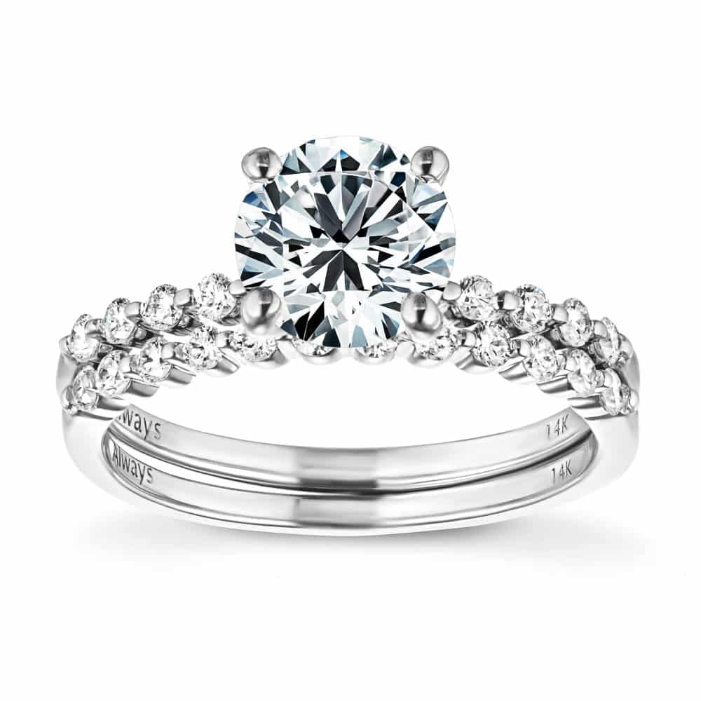 Shown with a 1.0ct Round cut Lab-Grown Diamond with accenting diamonds on the band in recycled 14K white gold with matching wedding band, can be purchased together for a discounted price | diamond accented engagement ring Shown with a 1.0ct Round cut Lab-Grown Diamond with accenting diamonds on the band in recycled 14K white gold with matching wedding band