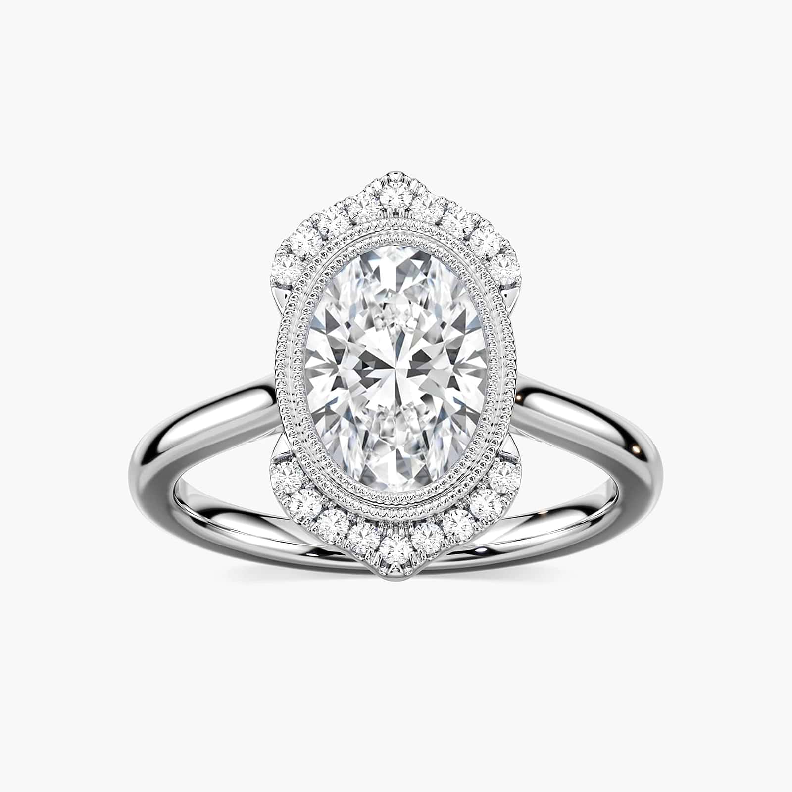 Shown with 2ct Oval Cut Lab Grown Blue Sapphire in 14k White Gold|Antique style blue sapphire engagement ring with milgrain bezel and accenting diamonds set in 14k white gold