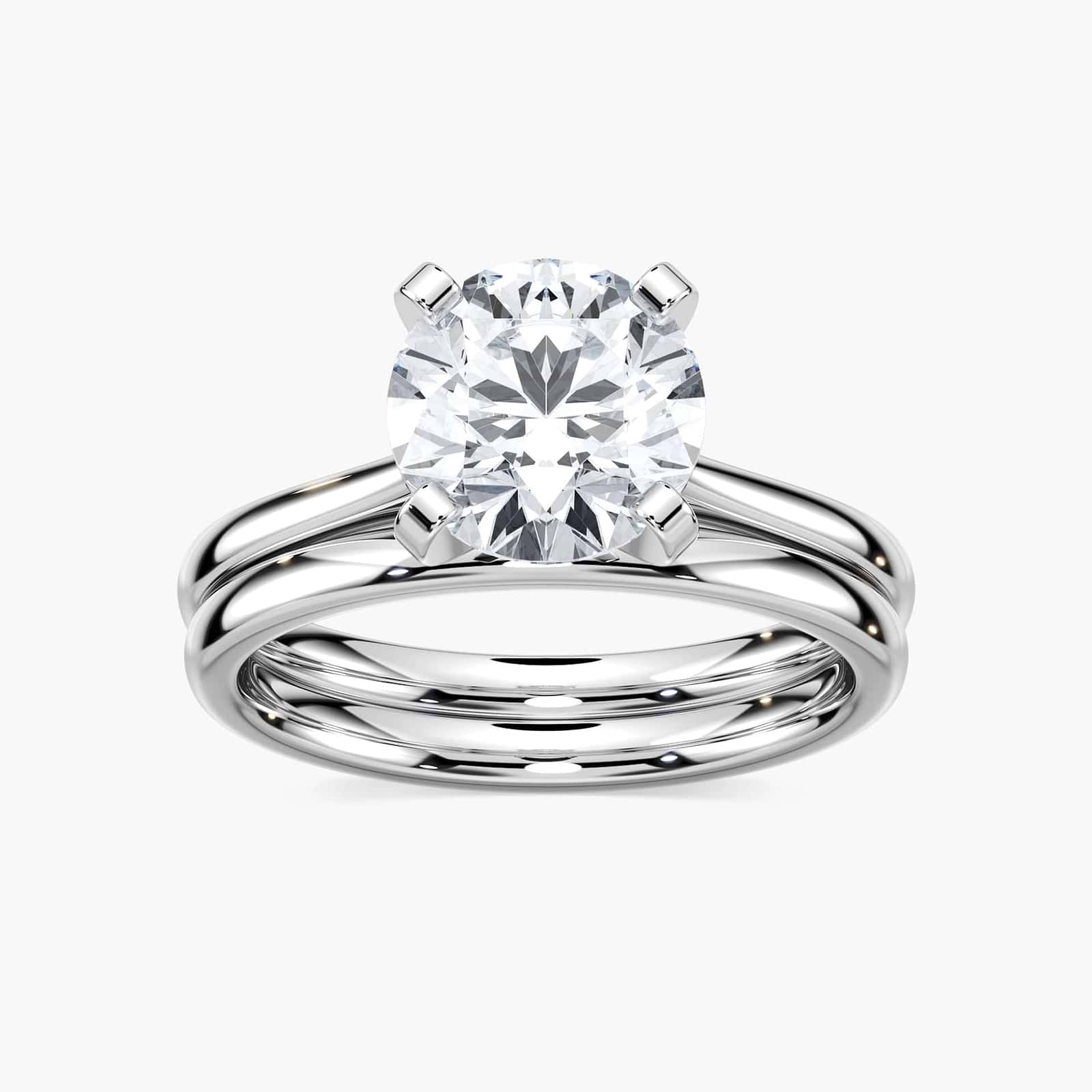 Shown with a 1.0ct Round cut Lab-Grown Diamond in recycled 14K white gold with matching wedding band | wedding set with 1.0ct round cut lab-grown diamond with recycled 14k white gold